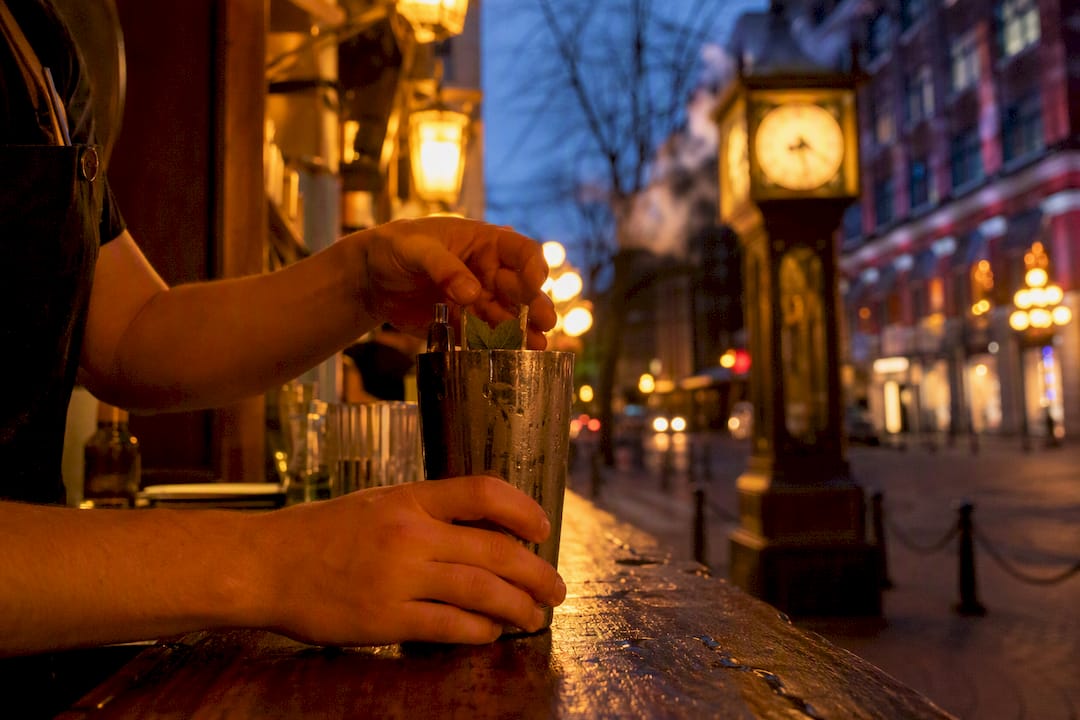 Pouring cocktail at Gastown food tour