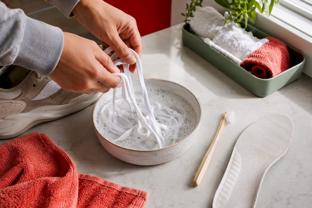 Save Your Sneakers: Material First Sneaker Cleaning with Dish Soap 2026 Lizard's Lunch Sneaker laces soaking in soapy water