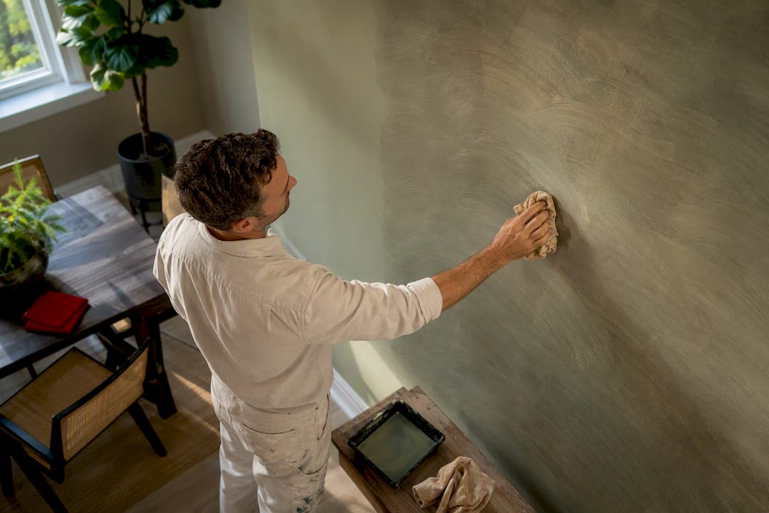 Weekend Room Prep First: Interior Painting for DIYers or Hire? 2026 Lizard's Lunch Hand applying glaze to painted wall